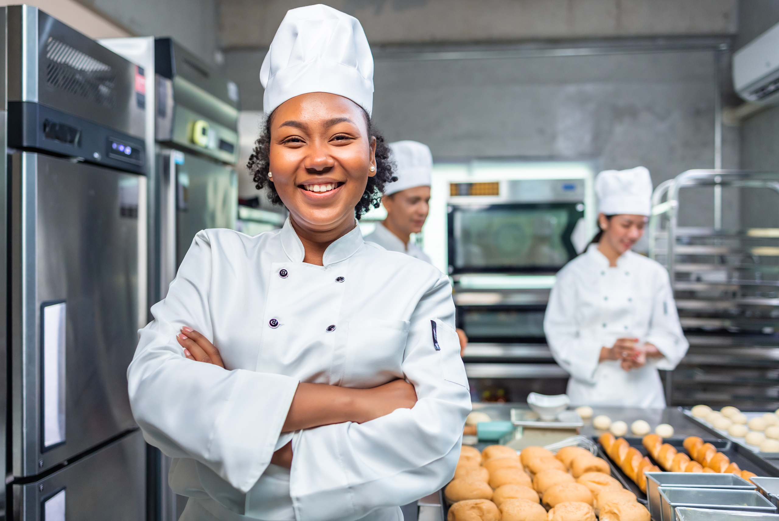 Restaurant kitchen staff using NX Kitchen Displays